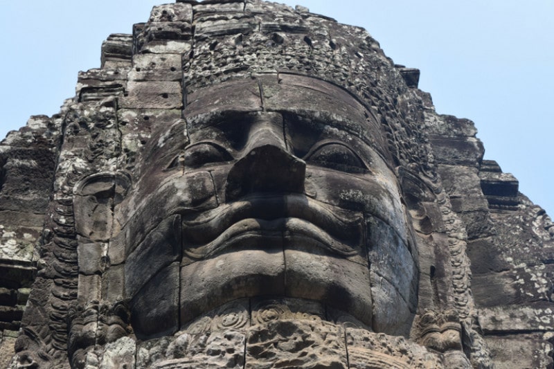 A very large stone face in angkor wat cambodia