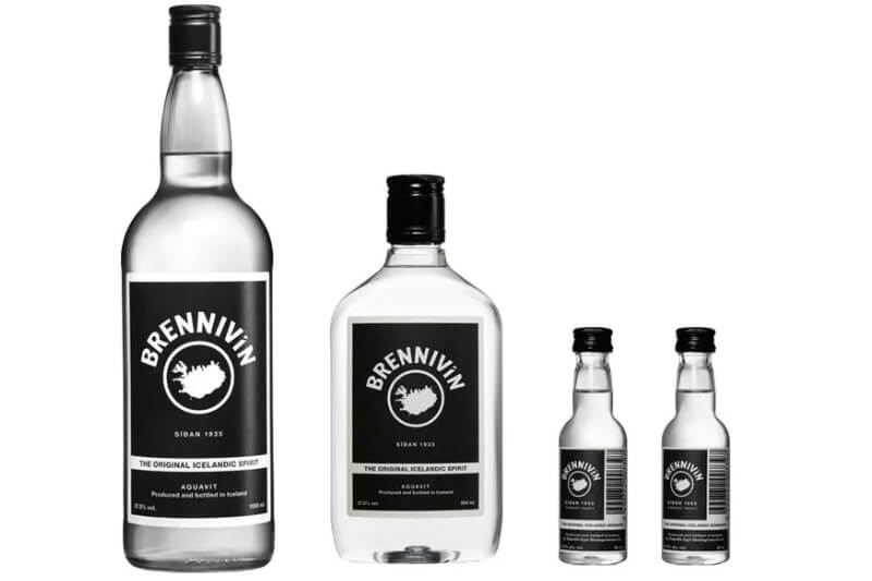 4 bottles of white spirit with black label on saying Brennivin